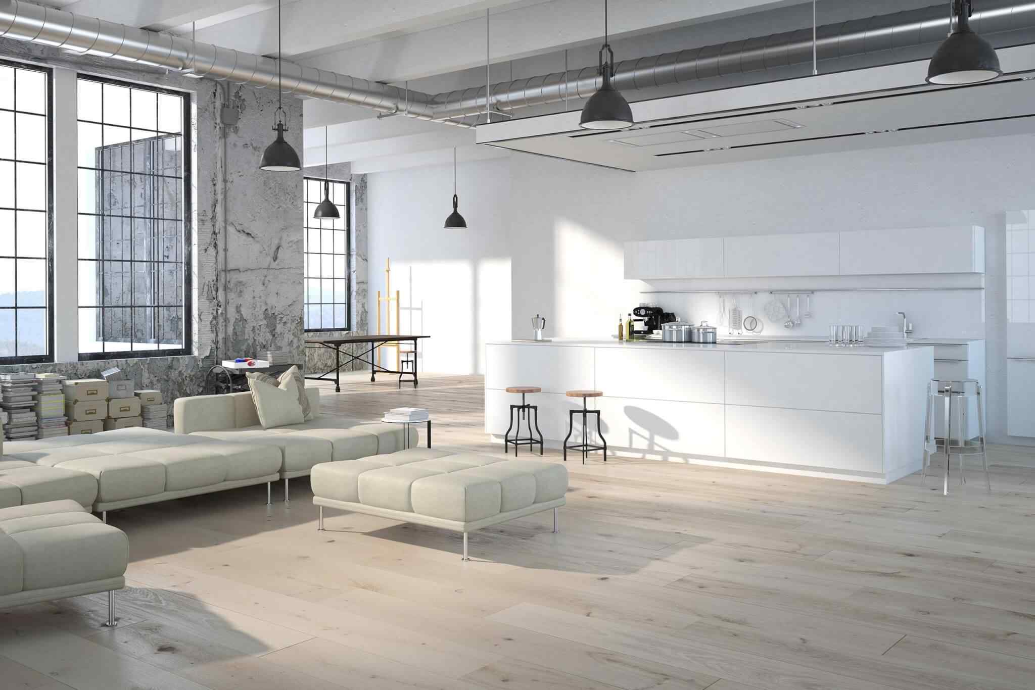 A white room with a couch and chairs