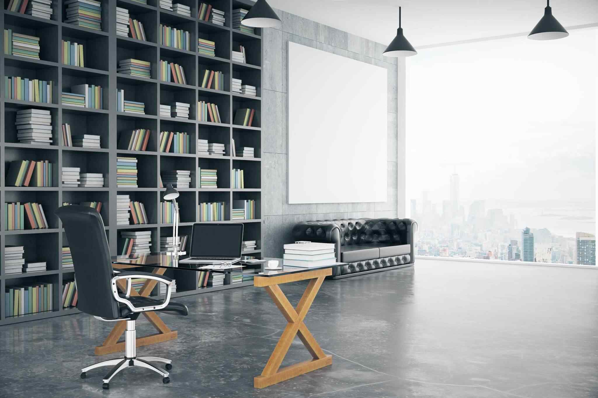 A room with two desks and a large bookshelf.